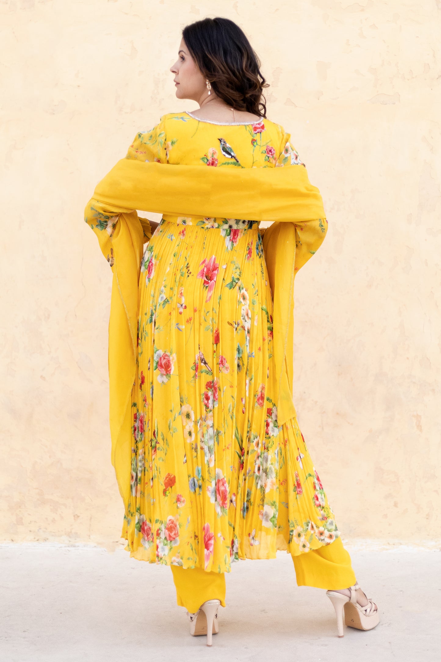 Yellow Anarkali suit with Organza dupatta.